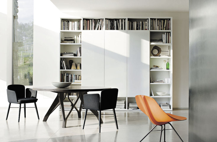 perfect-black-table-set-on-white-ceramic-floor-paired-with-compact-white-bookshelves-idea.jpg